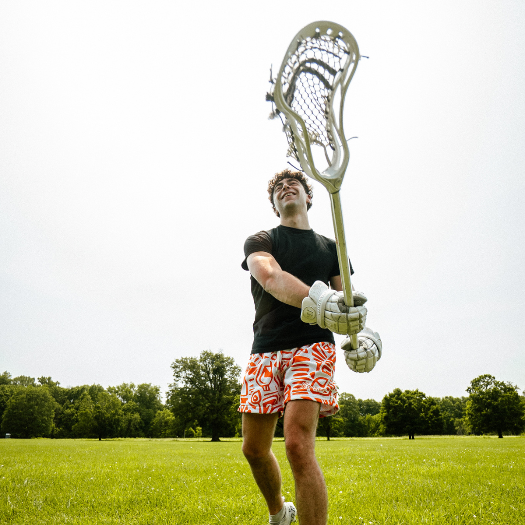 Orange Tribal Mesh Shorts